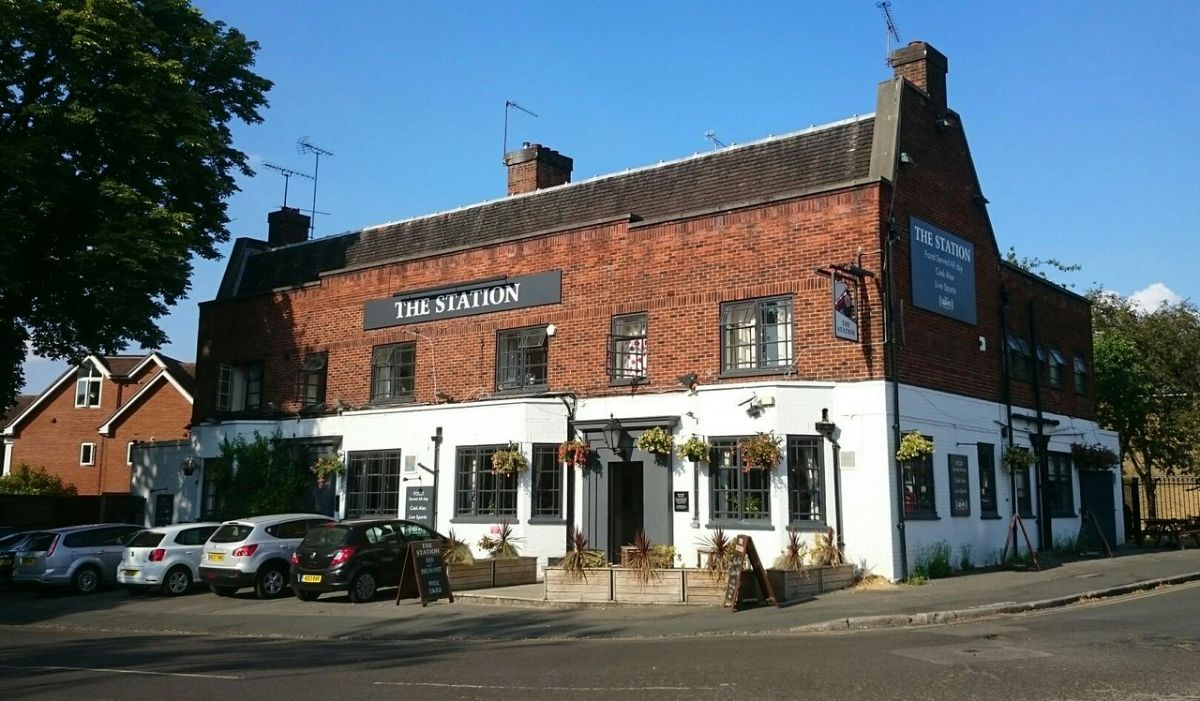 The Station pub building on Station Road, West Byfleet