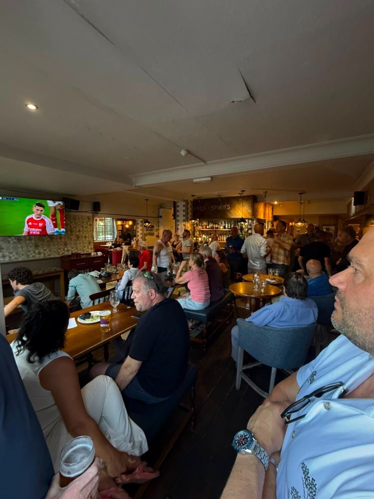 Fans watching football at The Station